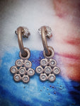 Infinity dangles on Secret hoops